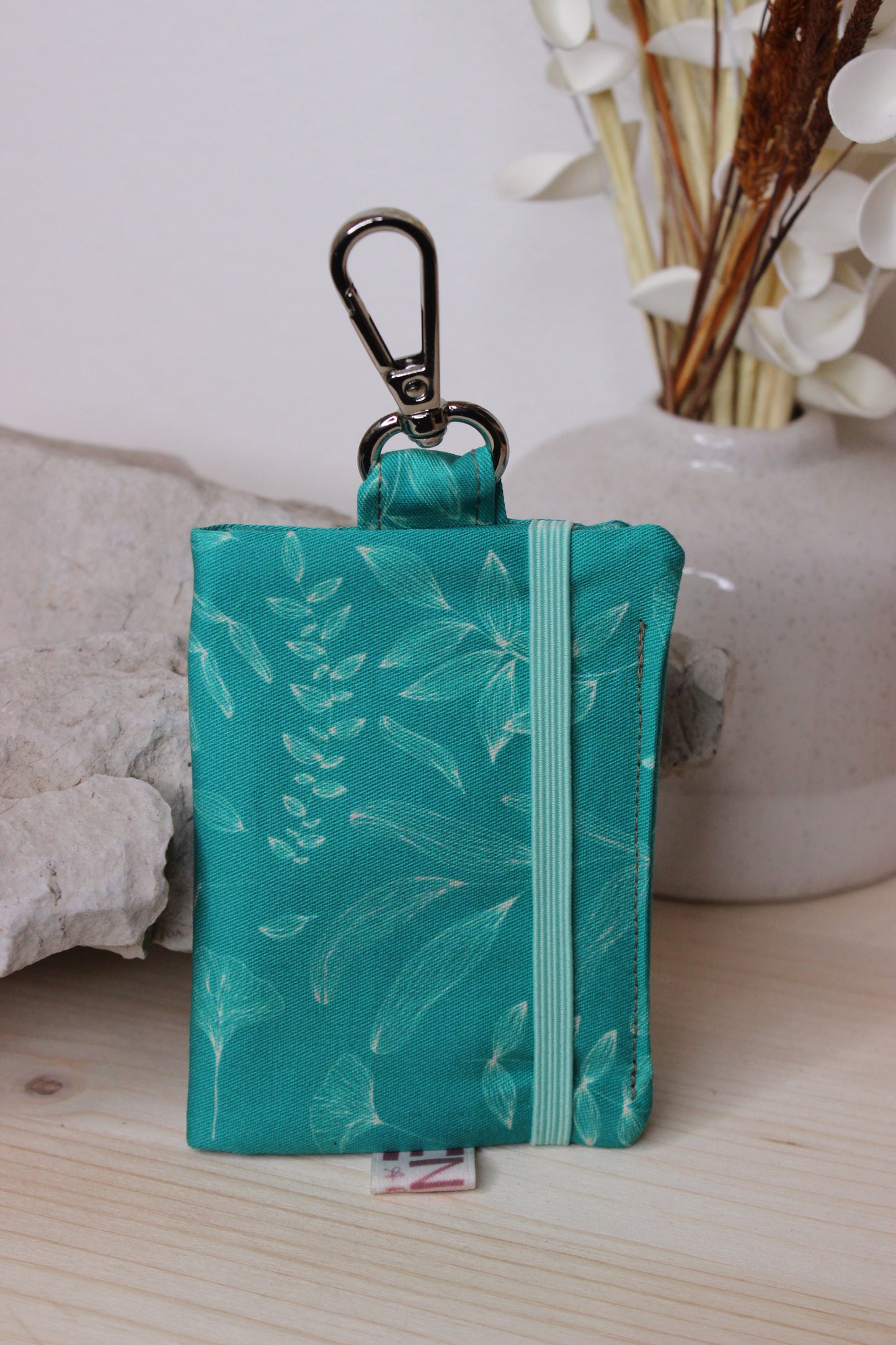 Porta carte con gancio